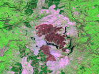 What is causing the unprecedented scale of Wales' wildfires?