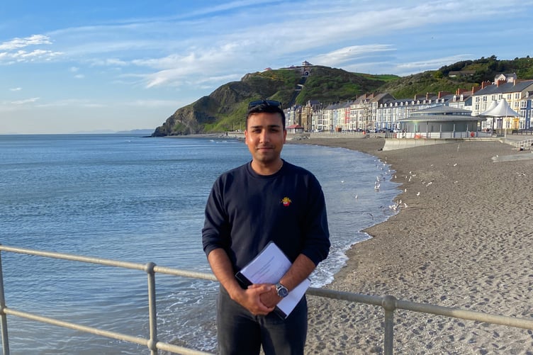 Aberystwyth Town Councillor Nishant Chandolia tabled the motions that will protect Aberystwyth's waterways, prioritising ocean recovery in council decisions. Photo: Nishant Chandolia