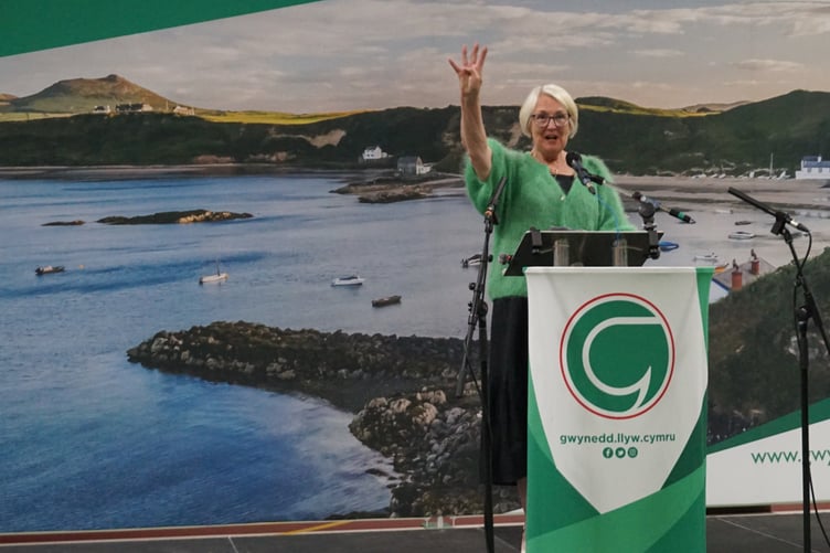 Siân Gwenllian during her victory speech, counting the four Plaid Senedd Members elected.