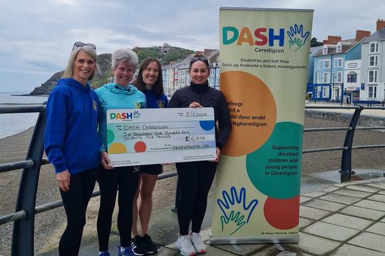 Presenting the cheque, left to right, Karen Davies, Ceris Williams, Kirsten Hughes and Bridget Harpwood