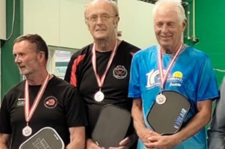 John Carvell and Nigel Jones won the over 65s doubles
