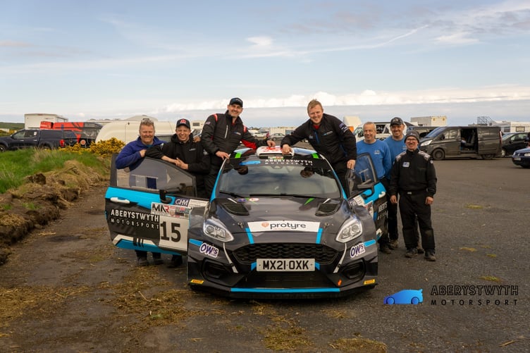Aled Wyn Morgans and Jack Bowen with their Aberystwyth Motorsport Fiesta Rally2 and crew