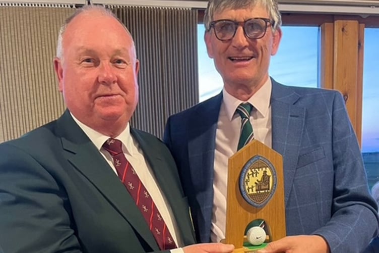 Alastair Fisher captain of OUGS receiving the Morton Trophy from Harri Jones captain of Borth and Ynyslas Golf Club