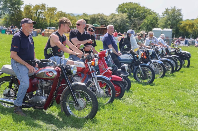 Motorcycles line up in the main ring