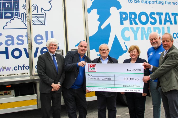 The cheque was presented to John Daniels and Deryc Rees from Prostate Cymru by Ian Rickman and Peter Davies from the Farmers' Union of Wales, with Brian and his wife Helen also present.
