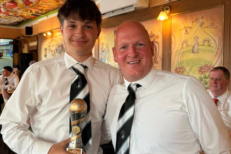 Efan Anwyl with manager Adam Morris