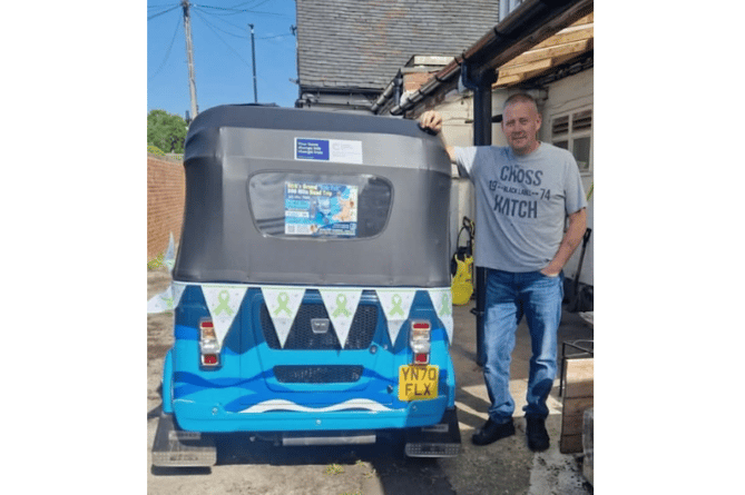 Kirk Garbett and his tuk-tuk