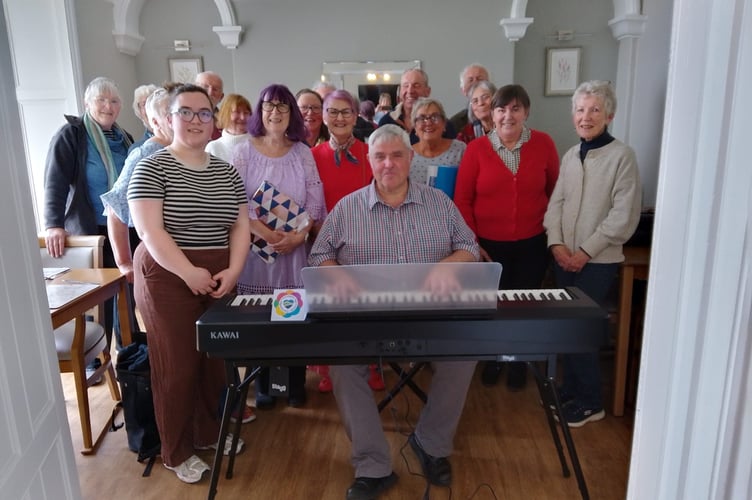 Côr Dyffryn Arth Choir with their new keyboard, bought with grants from CAVO Age-Ceredigion and Ceredigion County Council