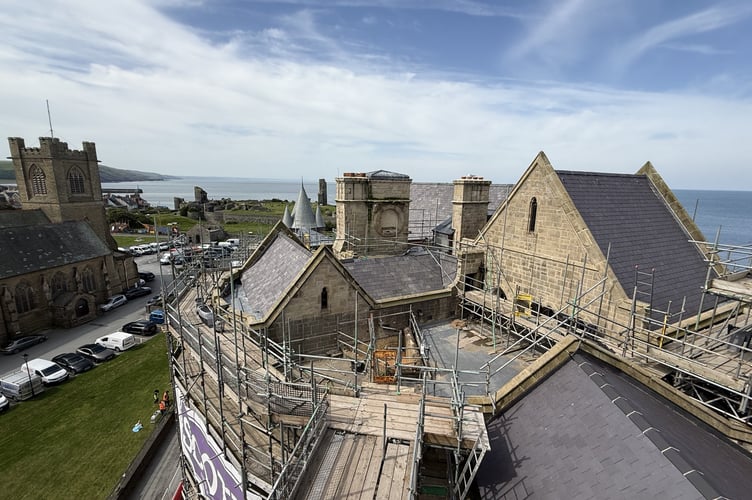 Looking over the rear of the Ferguson building from the tower of Old College. The top of the triangular lightwell can be seen in the middle of the image.