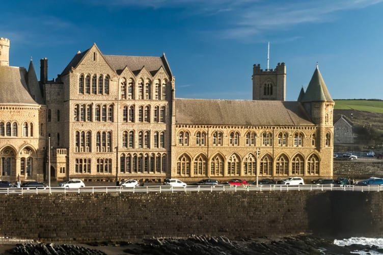 The tall five-storey Ferguson building (including basement) completed in 1898, connected the north and south wings of Old College for the first time.
