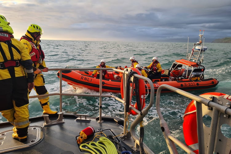 New Quay RNLI working with Aberystwyth RNLI to rescue the stricken yacht and sailor