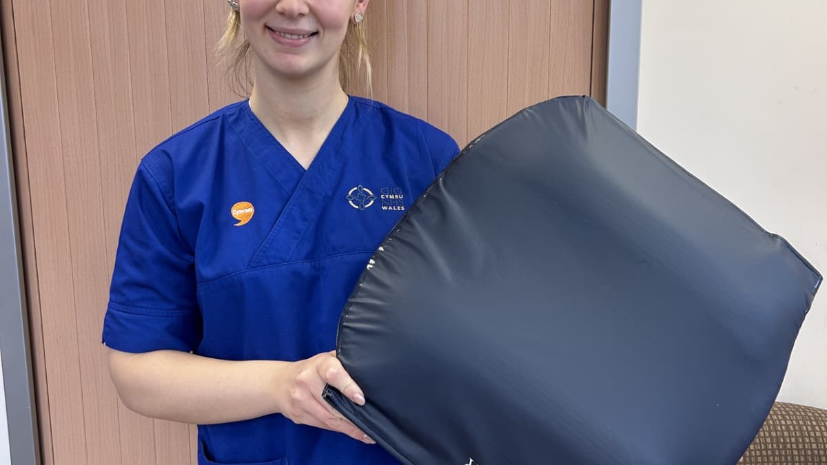 Charity-funded cushions bring relief for cancer patients