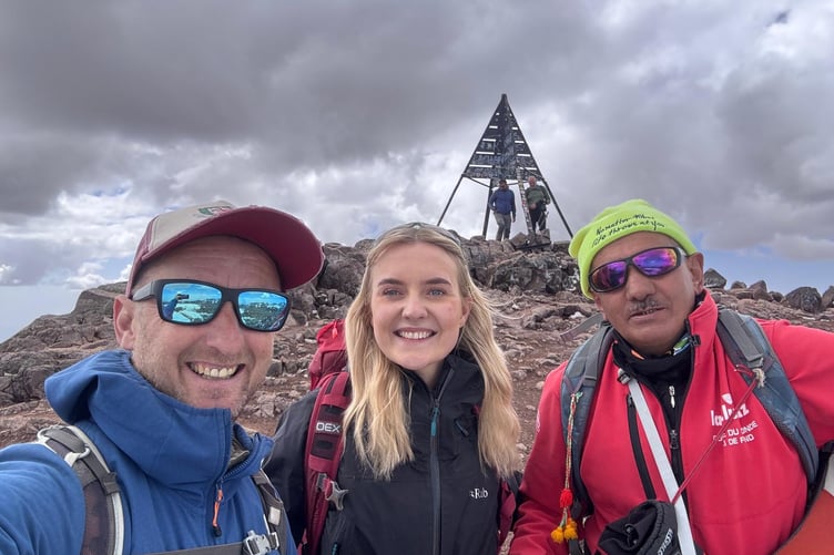 Merfyn Jones, aka 'Smyrff, with fundraiser Claire Penney and a local Sherpa