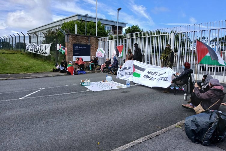 Protestors blocking entry to MOD Aberporth on 10 June.