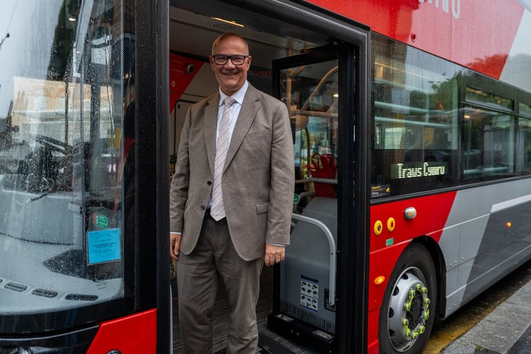 Deputy Minister for Transport Mark Hooper at the launch of 30 new TrawsCymru buses in Aberystwyth