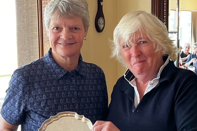 Captain Jane Miller presenting the Griffiths Salver to Debbie Jones
