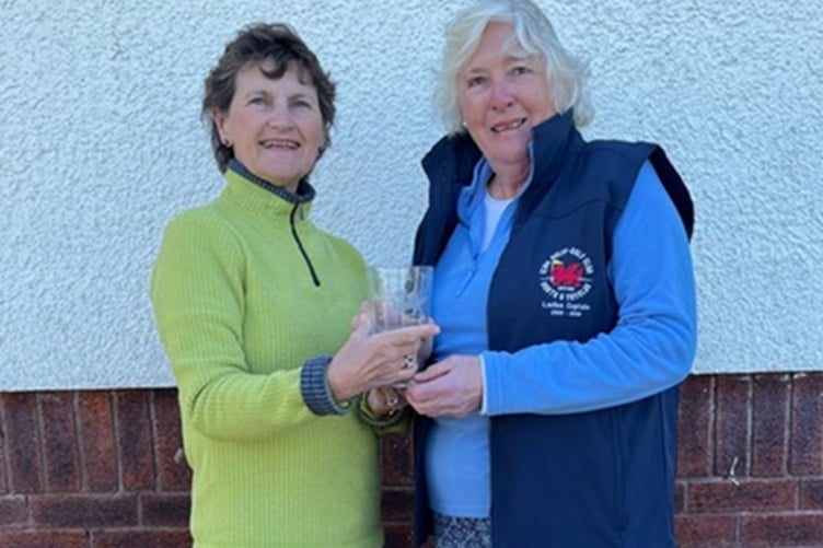 Captain Jane Miller presenting the Wilding Goblet to Jane Raw Rees