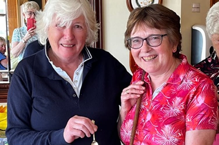 Captain Jane Miller presenting the Evelyn Jenkins Trophy to Barbara Flanagan