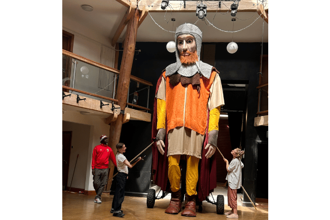 In rehearsals with the Lord Rhys puppet. Photo: Small World Theatre