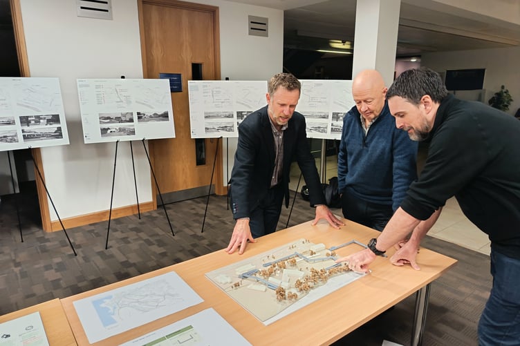 County Councillors Shelley Childs and Alun Williams viewing plans at the consultation event. Photo: Ceredigion County Council