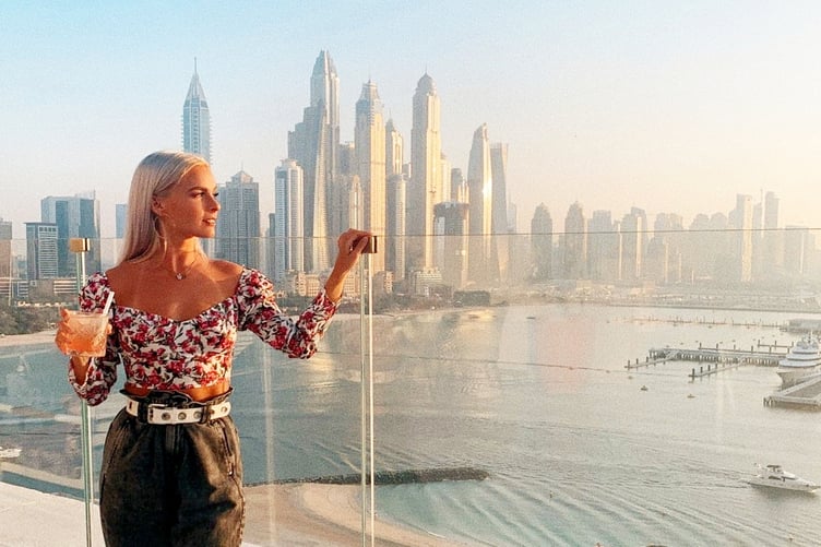 Mez Olivia, 30, from Lampeter, Wales, suffered a brain haemorrhage while working in Dubai. // A woman who collapsed without warning while working in Dubai had to relearn how to walk after suffering a life-threatening stroke and brain bleed that left her unable to feel the right side of her body. Mez Olivia, 30, from Lampeter, Wales, was living in Dubai and working as a costume character animator and dancer when her life changed in October 16, 2021. The social media manager says she had no symptoms whatsoever before collapsing at work and waking up days later in intensive care. Doctors discovered Mez had suffered a brain haemorrhage caused by an arteriovenous malformation (AVM) - a tangle of abnormal blood vessels in the brain. She spent 11 days in intensive care and underwent emergency treatment after doctors warned her family that without intervention she would die. After stabilising in Dubai, Mez was flown back to the UK in December 2021 as her insurance coverage was running out.
