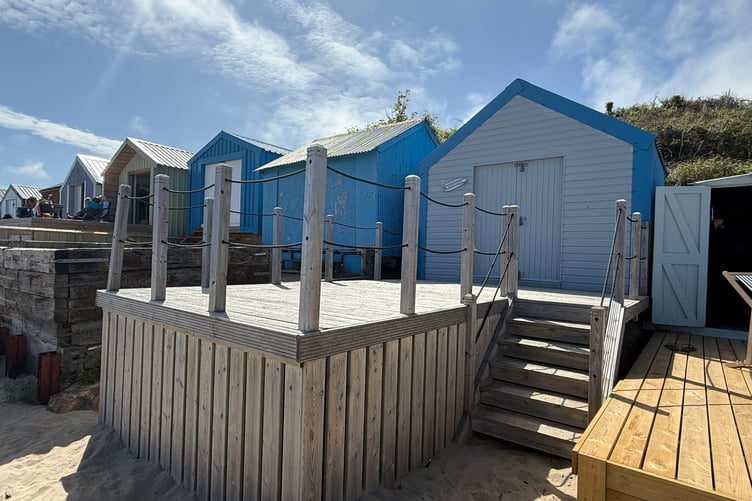 The beach hut for sale on Porth Mawr beach. // A Welsh beach hut in 'Cheshire-on-Sea' with no power has gone on sale for 200K - the same as the average house price in Wales. The detached cabin, made of timber and corrugated iron, is one of 17 huts on Porth Mawr beach. Estate agent Rhys Elvin expects the hut to be highly sought after. The cabin located on the sands of Abersoch in Gwynedd is listed at just £15,000 below last year's average Welsh house price. The hut was rebuilt in 2023.