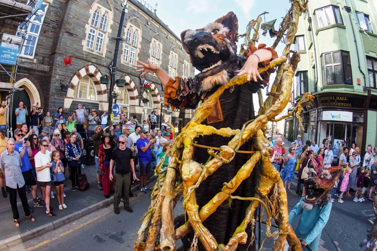 A wolf puppet in the parade