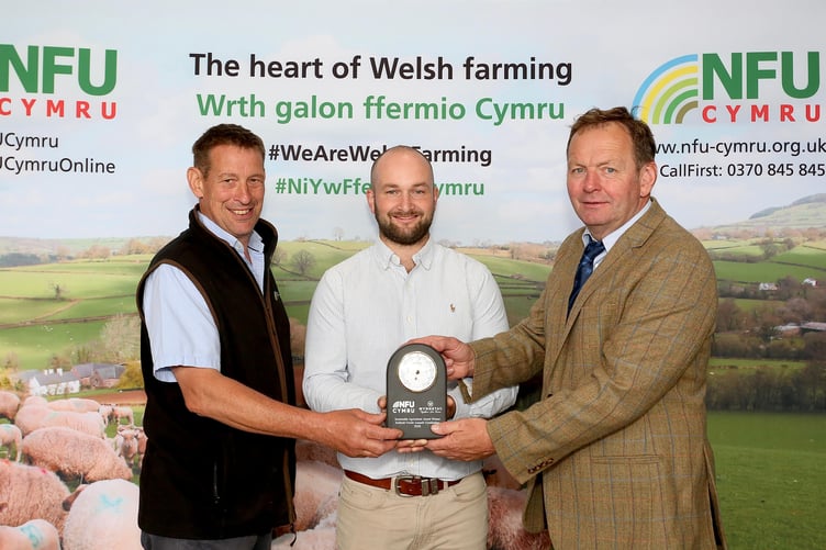 Pictured (L-R) NFU Cymru Rural Affairs Board Chair Gary Yeomans; NFU Cymru/Wynnstay Sustainable Agriculture Award winner Peter Loxdale; and Wynnstay National Sheep & Beef Specialist Bryn Hughes