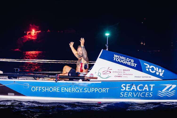 Ian Baylis celebrates completing the World’s Toughest Row in aid of Wales Air Ambulance.
