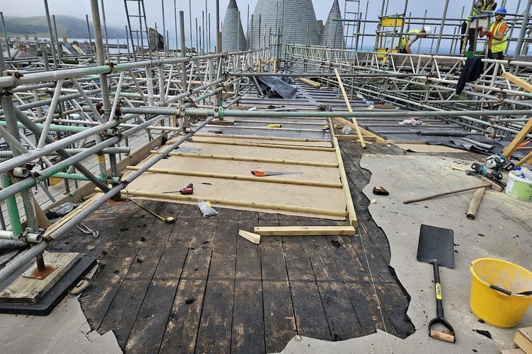 The bitumen covering was replace section by section to prevent rain getting into the building.
