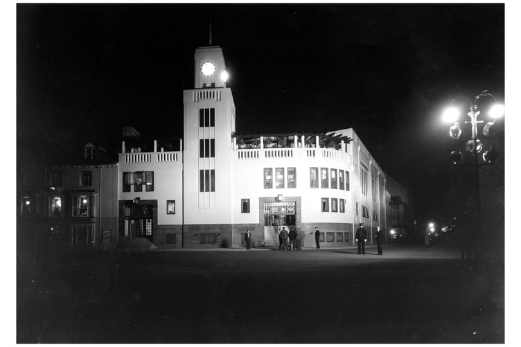 Also included in this night-time photograph from c1934 of the newly built Municipal hall, renamed Kings Hall in 1935, taken by Pickfords. Photo: National Library of Wales