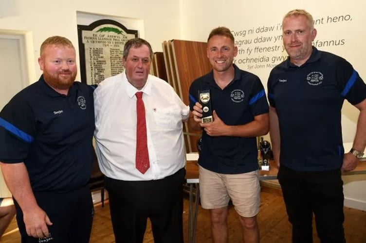 Nefyn's management team - Michael John Evans, Steve Jones and Alan Jones - with NWCFA rep Alun Foulkes (Photo: Arwyn Roberts)