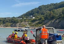 RNLI crew and lifeguard team up to rescue stricken kayakers