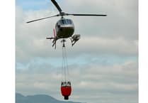 Firefighters tackle Rhinogydd wildfire with helicopter support