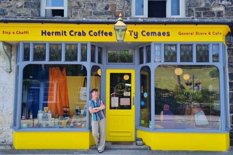 A successful Machynlleth cafe business owner Olly Cameron has opened the doors of Hermit Crab Coffee: Tŷ Cemaes, hoping to return the resource back to the local community.
