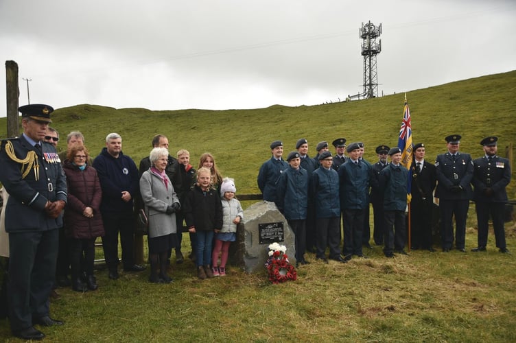 Staff and cadets from 561 Squadron Air cadets, the family of Sgt Harker including his daughter, Janet, Air Commodore Rob Wood (Air Officer Wales) and members of the farmer’s family whose land the memorial is on gathered for the unveiling of the memorial. Photo: Mid Wales Memorial Project