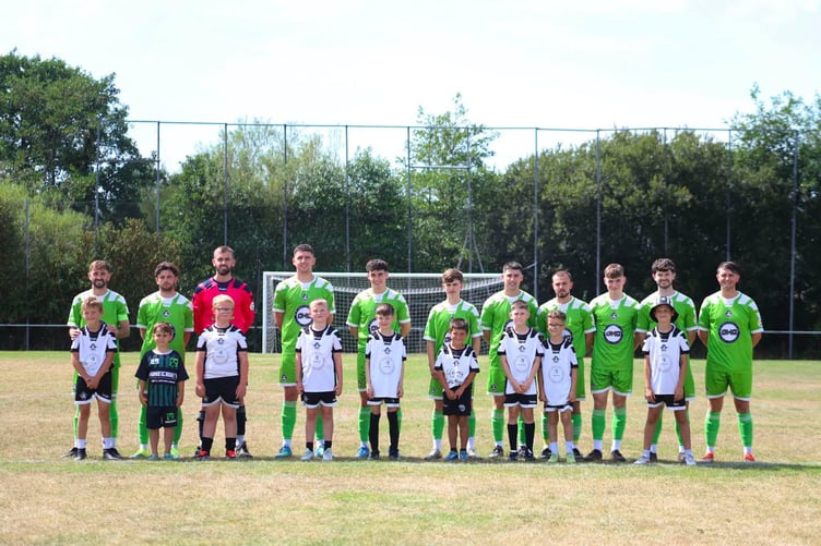 Pwllheli with their mascots from the club's under 9s side