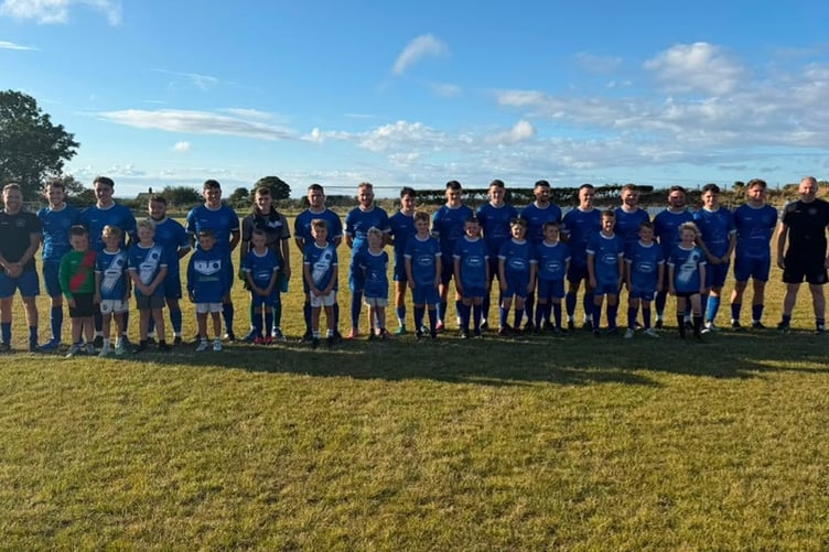 Nefyn and mascots pictured before their midweek victory against Bethesda Athletic