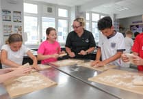 Young pizza makers serve up summer fun at Gwynedd school workshop