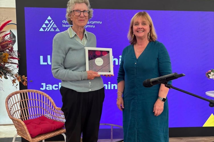 Jackie Willmington pictured with Llinos Roberts, Aled's widow