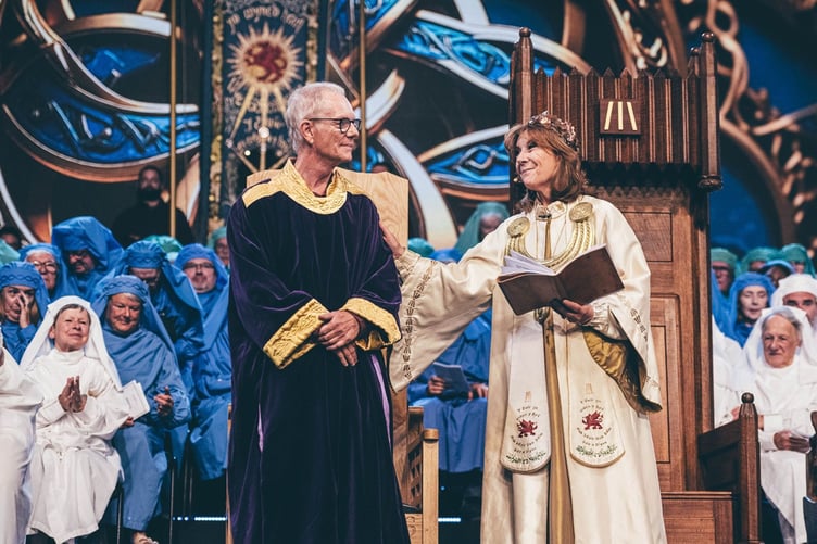 Chair winners Emyr Lewis is congratulated by Archdruid Mererid Hopwood