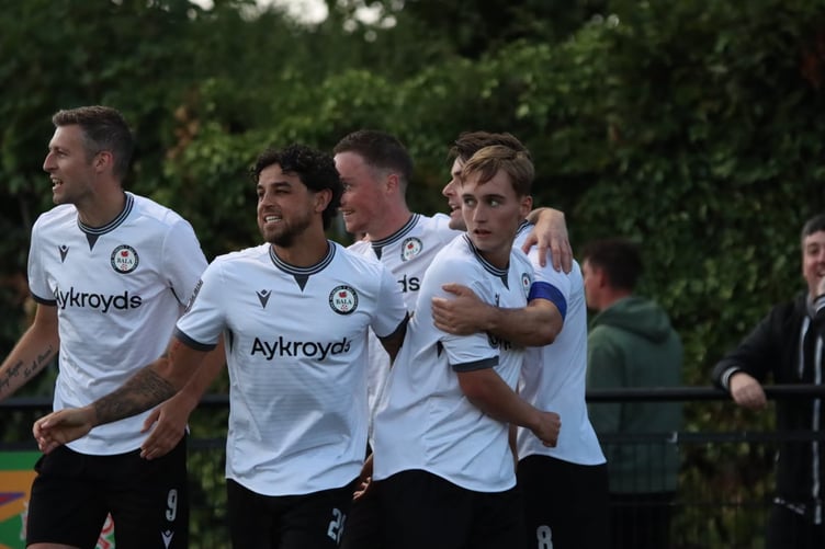 Celebrations after Iwan Lewis gave Bala a two-goal lead