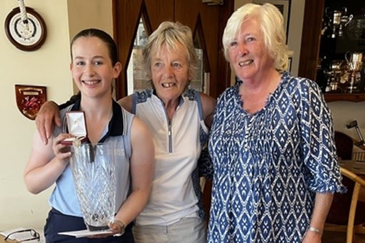 Club champion Lucy Hurst with captain Jane Miller and Sue Wilson