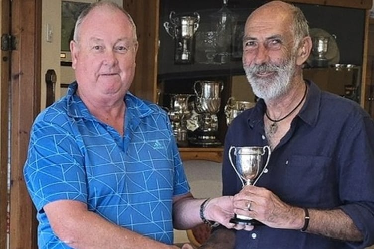 Nett champion Jon Cook with captain Harri Jones