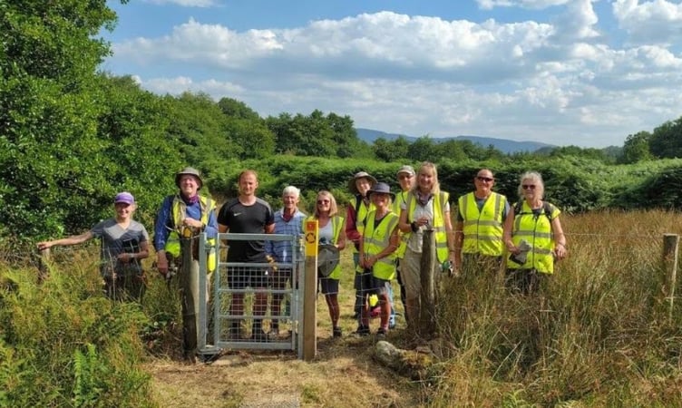 Meirionnydd Ramblers with one of the newly installed gates. Photo: Sam Hollingworth, Gwynedd Council