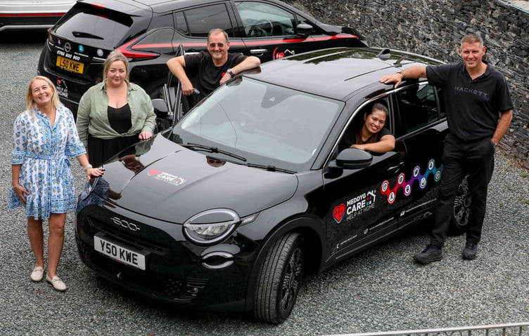 Meddyg Care director Nicola Rutherford, family liaison officer Laura Haynes, driver Mark Grayson Wood, carer Irene Asuncion and MD Kevin Edwards. Photo: Rick Matthews