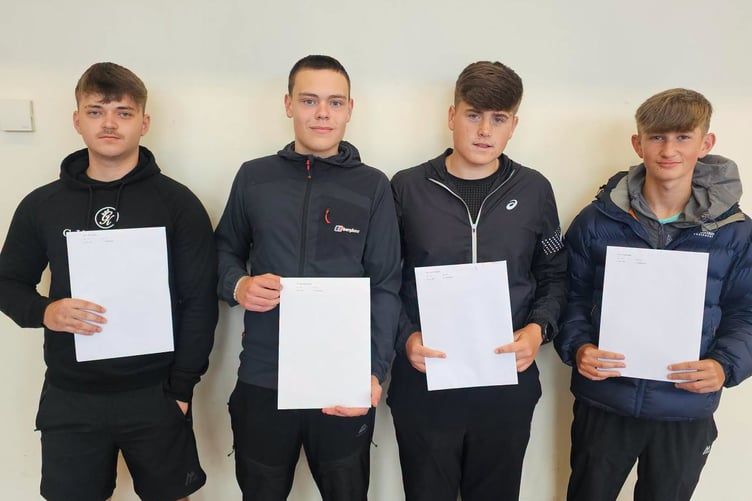 Some of the Ysgol Glan y Mor pupils are pictured with their results