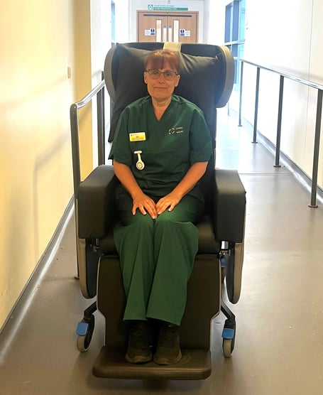 Health Care Support Worker Delyth Charles-Davies in one of the new chair