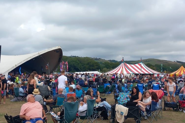 Hundreds of people have gathered at Lovesgrove in Aberystwyth for the first day of this year's Big Tribute festival. Photo: Julie McNicholls Vale