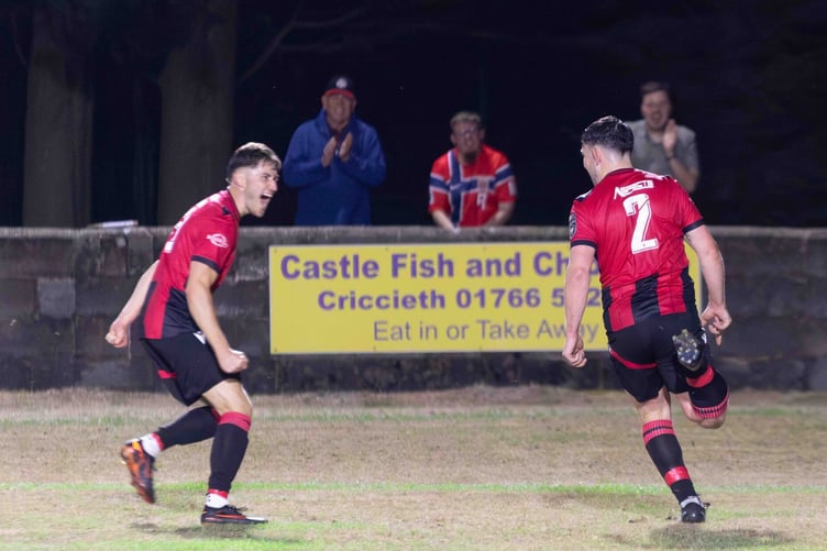 Celebrations after Morgan Owen (right) equalised for Porthmadog against Caersws (Photo: Jeff Guile)